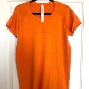 *Never worn* Swiftly Tech Short-Sleeve Shirt 2.0 Hip Length - Size 14